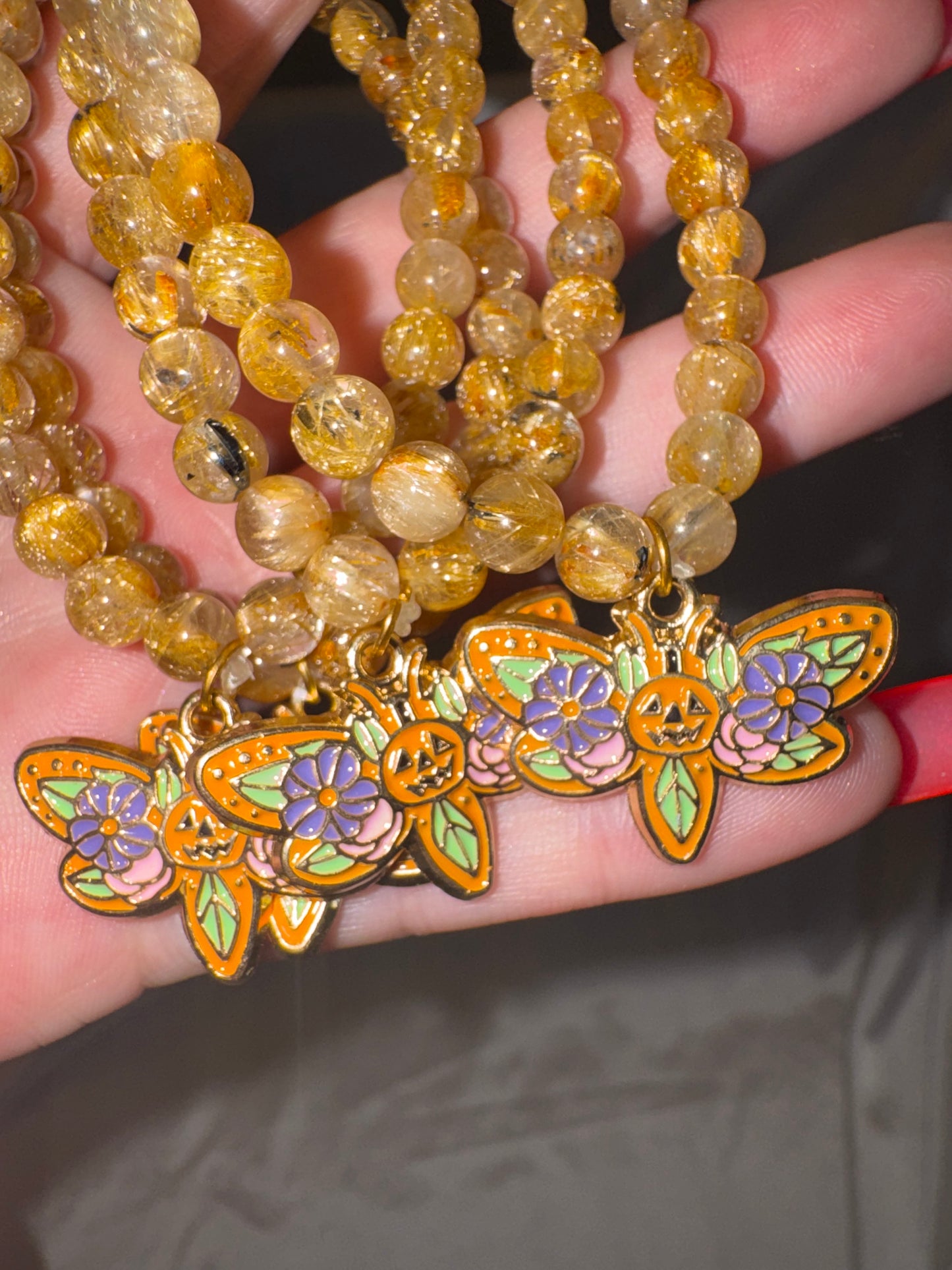 Gold Rutile Quartz AAA 6mm Bracelet with Pumpkin Moth